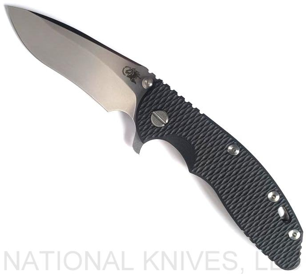 Rick Hinderer Knives XM-18 3.5" Recurve folding knife with thumb stud and flipper tab - shown open presentation side.  Stonewash 20CV stainless steel plain edge blade.  Black G-10 handle with stonewash bronze lock side.  Model KXM35REC.