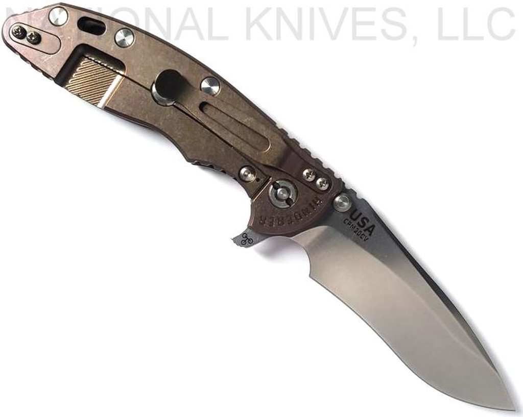 Rick Hinderer Knives XM-18 3.5" Recurve folding knife with thumb stud and flipper tab - shown open lock side.  Stonewash 20CV stainless steel plain edge blade.  Black G-10 handle with stonewash bronze lock side.  Model KXM35REC.