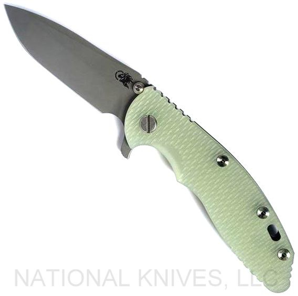 Rick Hinderer Knives XM-18 3.5" Spanto folding knife with thumb stud and flipper tab - shown open presentation side.  Working Finish S45VN stainless steel plain edge blade.  Translucent Green G-10 handle with Working Finish lock side.  Model KXM35SPA.