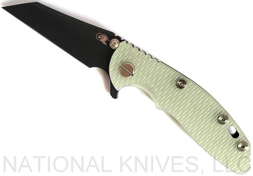 Rick Hinderer Knives XM-18 3.0" Wharncliffe folding knife with thumb stud and flipper tab - shown open presentation side.  Battle Black 20CV stainless steel plain edge blade.  Translucent Green G-10 handle with Battle Black lock side.  Model KXM3000WCDLC.