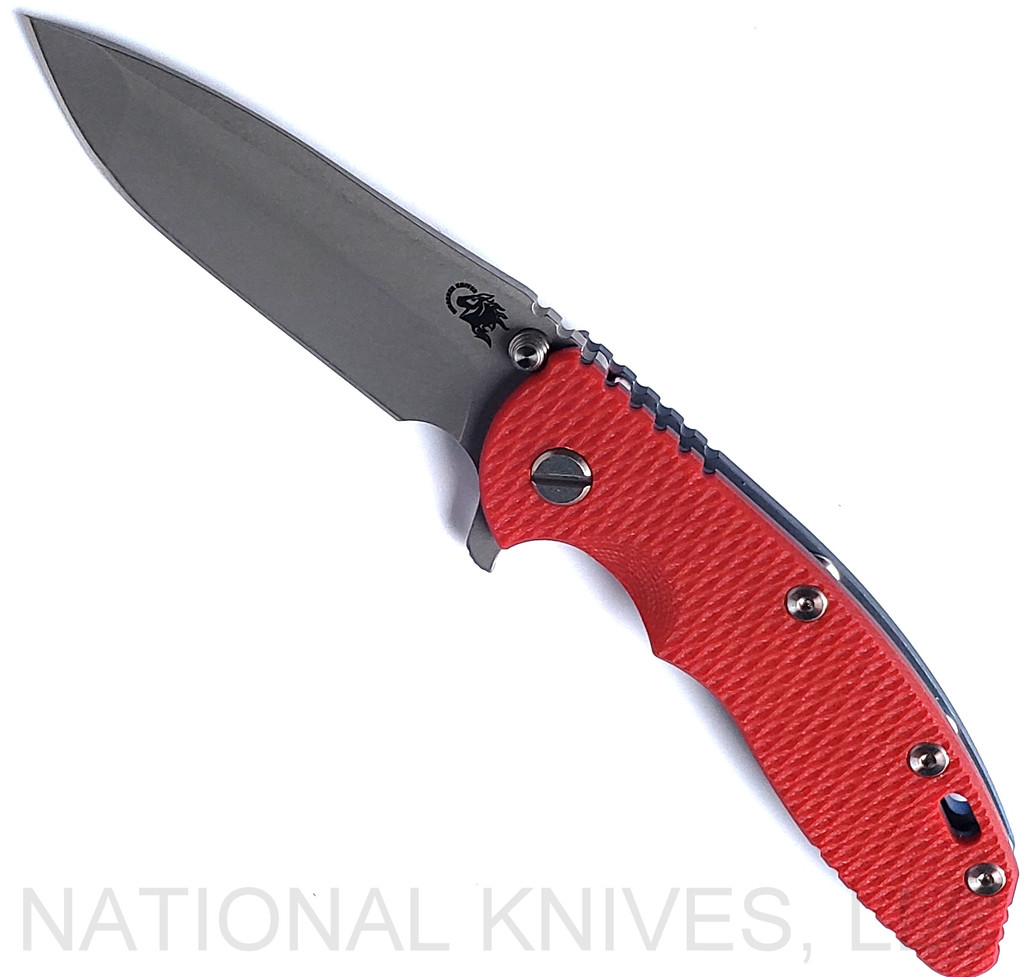 Rick Hinderer Knives XM-18 3.5" Spanto folding knife with thumb stud and flipper tab - shown open presentation side.  Working Finish S45VN stainless steel plain edge blade.  Red G-10 handle with Battle Blue lock side.  Model KXM35SPA.