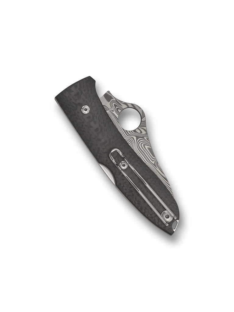 Spyderco SpyOpera Sprint Run folding knife with thumb hole - shown closed pocket clip side.  DS93X Damascus steel plain edge blade.  Black carbon fiber handle.  Model C255CFPD.