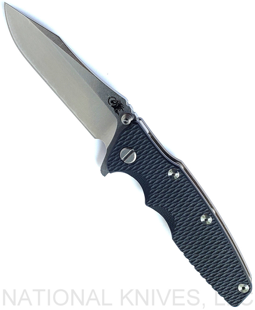 Rick Hinderer Knives Eklipse Spear Point folding knife with flipper tab and thumb stud - shown open presentation side.  Stonewash S45VN stainless steel plain edge blade.  Black G-10 handle with stonewash bronze lock side.  Model KEK35SPE.