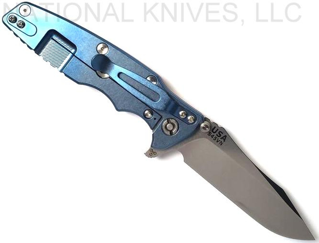 Rick Hinderer Knives Eklipse Spear Point folding knife with flipper tab and thumb stud - shown open lock side.  Stonewash S45VN stainless steel plain edge blade.  Red G-10 handle with stonewash blue lock side.  Model KEK35SPE.