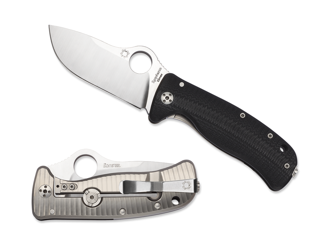 Spyderco Lil Lionspy folding knife with blade hole - shown open presentation side and closed pocket clip side.  Satin Elmax stainless steel plain edge blade. Black G-10 handle with titanium lock side.  Model C181GTIP.
For reference only.