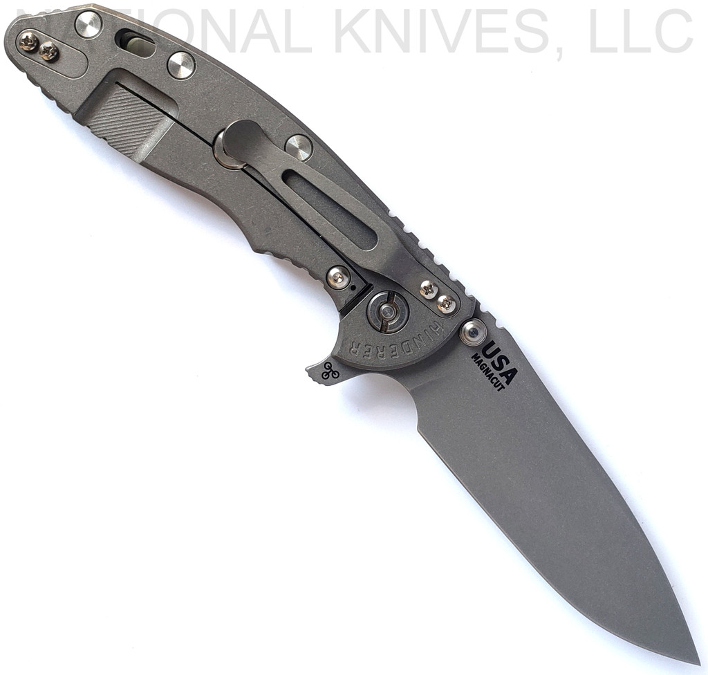 Rick Hinderer Knives Skinny XM-18 3.5" Slicer folding knife with thumb stud and flipper tab - shown open lock side.  Working Finish MagnaCut stainless steel plain edge blade.  Translucent Green G-10 handle with Working Finish lock side.  Model KXM35SKSL.