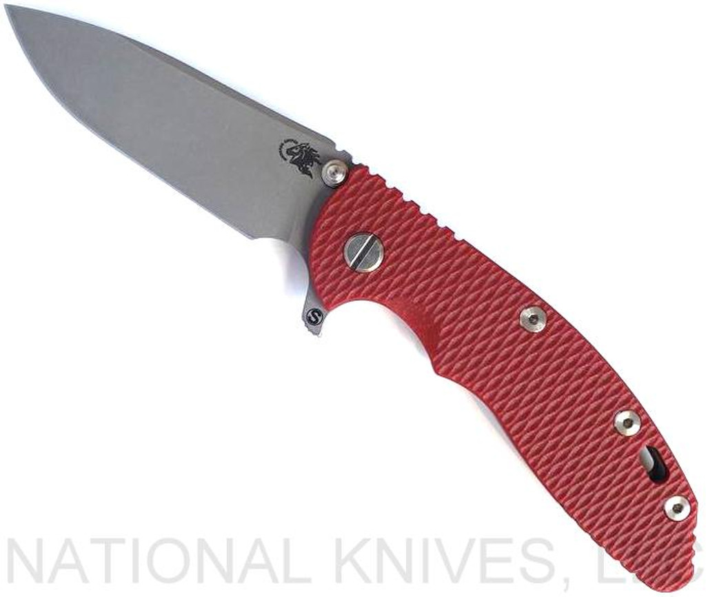Rick Hinderer Knives Skinny XM-18 3.5" Slicer folding knife with thumb stud and flipper tab - shown open presentation side.  Working Finish MagnaCut stainless steel plain edge blade.  Red G-10 handle with Battle Bronze lock side.  Model KXM35SKSL.