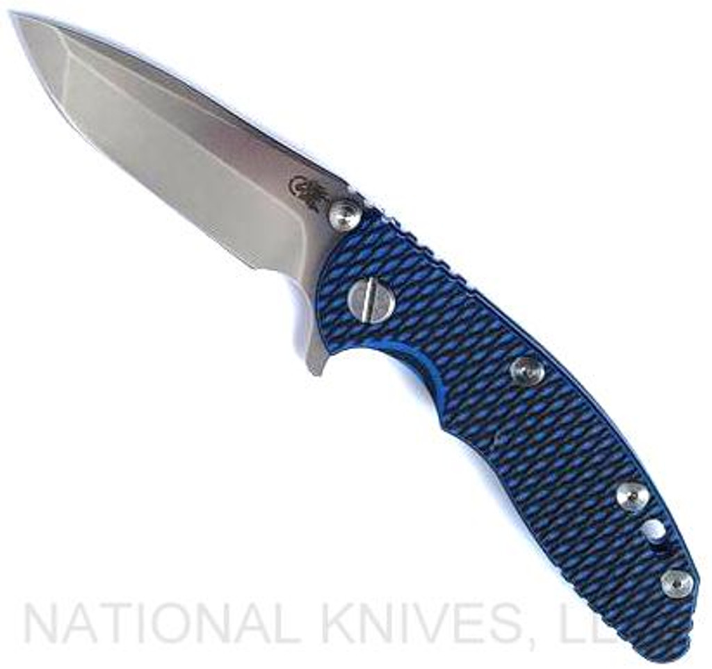 Rick Hinderer Knives XM-18 3.0" Spanto folding knife with thumb stud and flipper tab - shown open presentation side.  Stonewash 20CV stainless steel plain edge blade.  Blue - black G-10 handle with stonewash blue lock side.  Model KXM30SPA.