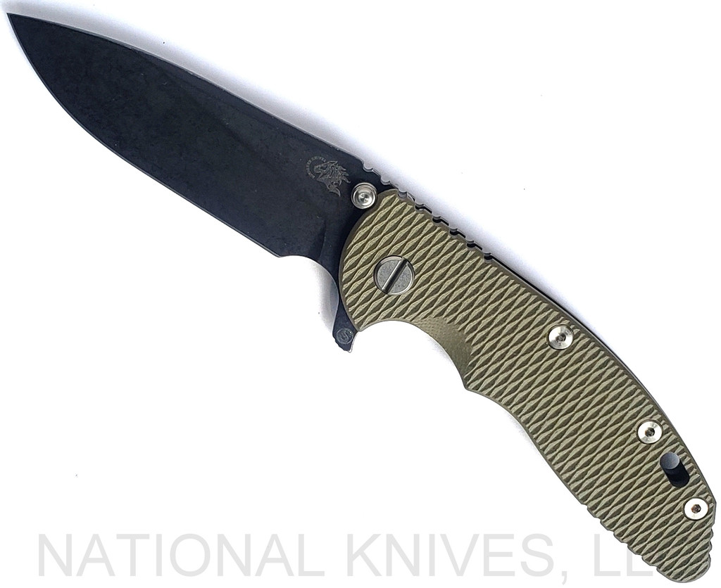Rick Hinderer Knives Skinny XM-18 3.5" Slicer folding knife with thumb stud and flipper tab - shown open presentation side.  Battle Black MagnaCut stainless steel plain edge blade.  OD green G-10 handle with Battle Black lock side.  Model KXM35SKSLDLC.
