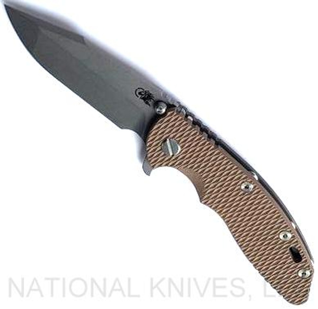 Rick Hinderer Knives XM-18 3.5" Harpoon Spanto folding knife with thumb stud and flipper tab - shown open presentation side.  Working Finish S45VN stainless steel plain edge blade.  
FDE G-10 handle with Battle Bronze lock side.  Model KXM35HS.