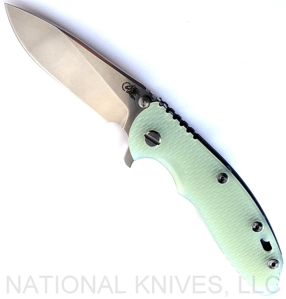 Rick Hinderer Knives XM-18 3.5" Slicer folding knife with thumb stud and flipper tab - shown open presentation side.  Stonewash S45VN stainless steel plain edge blade.  Translucent Green G-10 handle with Battle Blue lock side.  Model KXM35SL.