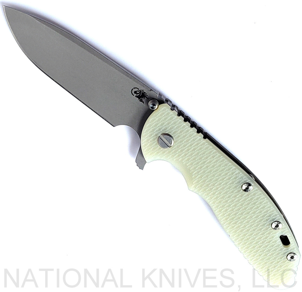 Rick Hinderer Knives XM-24 Spear Point folding knife with thumb stud and flipper tab - shown open presentation side.  Working Finish S45VN stainless steel plain edge blade.  Translucent Green G-10 handle with Battle Bronze lock side.  Model KXM40SPE.