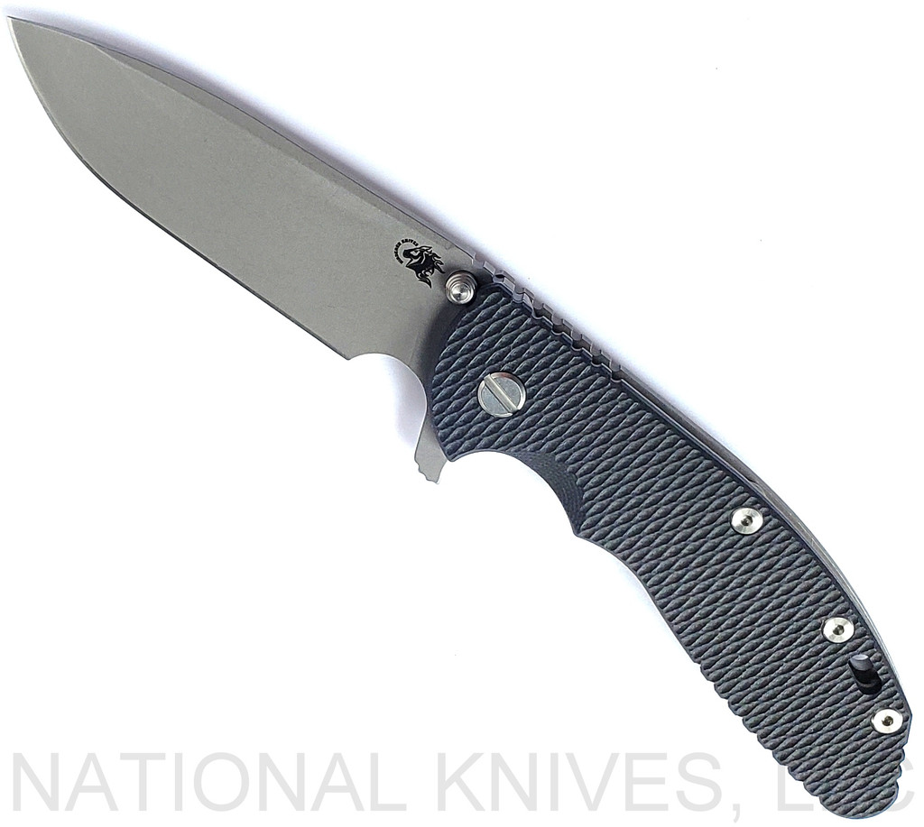 Rick Hinderer Knives XM-24 Spear Point folding knife with thumb stud and flipper tab - shown open presentation side.  Working Finish S45VN stainless steel plain edge blade.  Black G-10 handle with Working Finish lock side.  Model KXM40SPE.