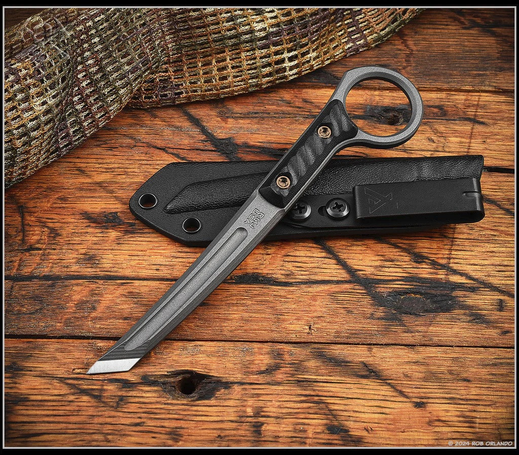 RMJ Tactical Stabby Guy multitool - shown out of sheath obverse.  Tungsten Cerakote 3V steel.  Black G-10 handle.  Model K-SG-TU-BK.