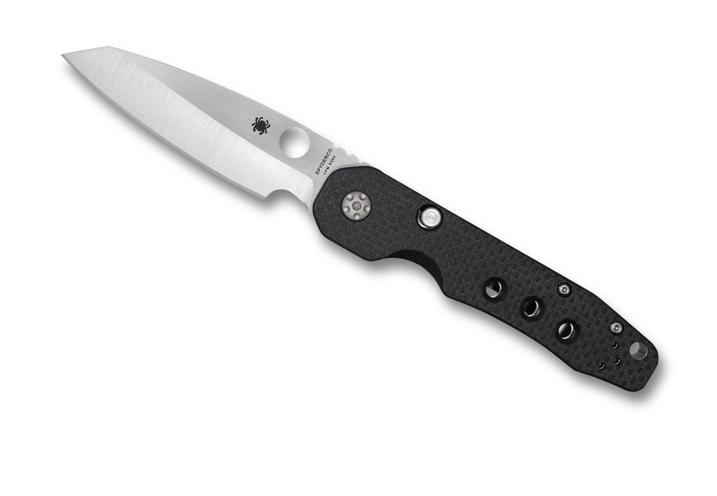 Spyderco Smock folding knife with thumb hole and flipper - shown open presentation side.  Satin S30V stainless steel plain edge blade.  Black carbon fiber and G-10 laminate handle.  Model C240CFP.
