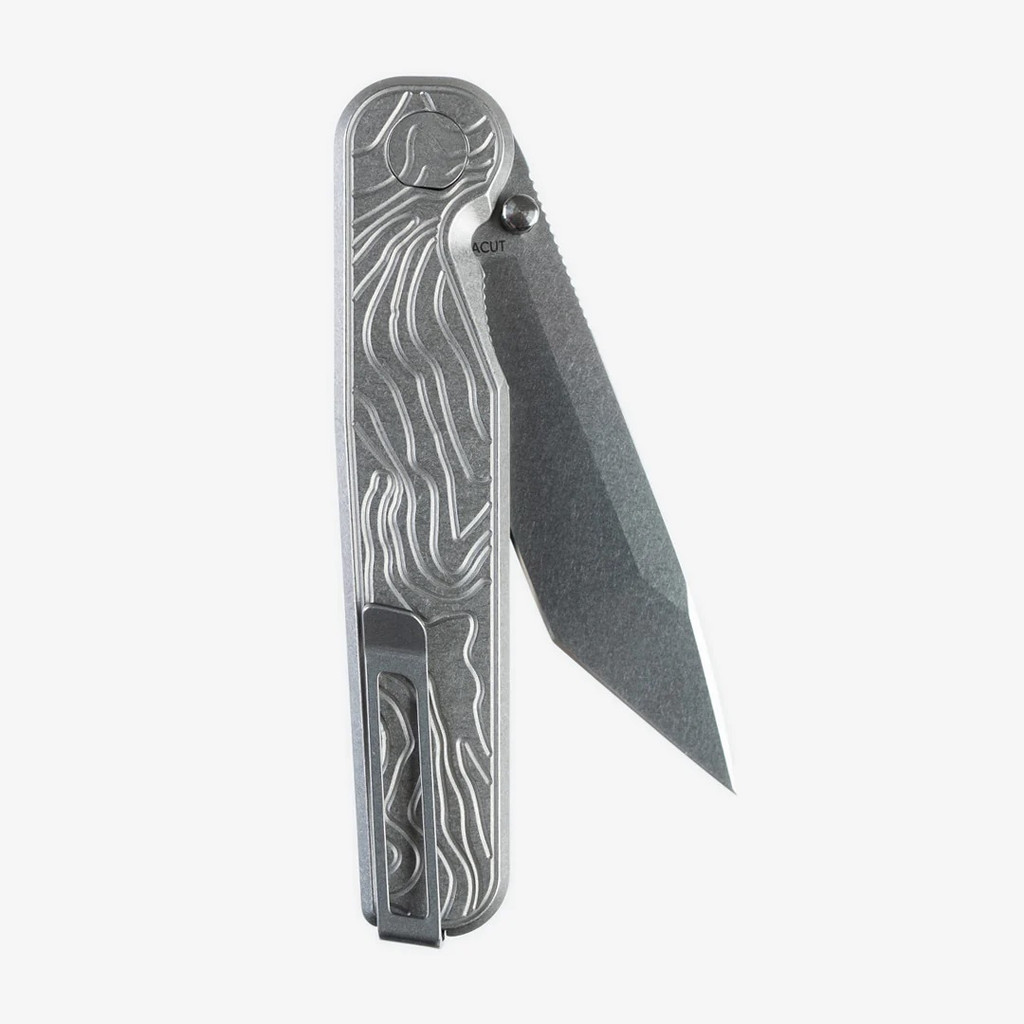 Tactile Knife Co Topographical Rockwall folding knife with thumb stud - shown partially open pocket clip side.  Stonewashed MagnaCut stainless steel plain edge Tanto blade.  Topographical titanium handle.  Model 20-RT-MCTN-TOPO.