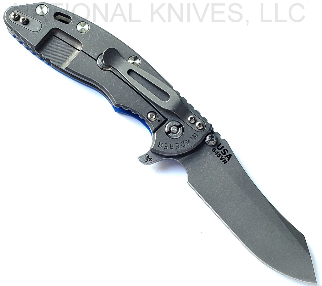 Rick Hinderer Knives XM-18 3.5" Skinner folding knife with thumb stud and flipper tab - shown open lock side.  Working Finish S45VN stainless steel plain edge blade.  Blue G-10 handle with Working Finish lock side.  Model KXM35SKINNER.