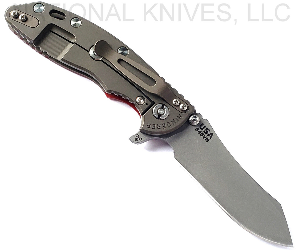 Rick Hinderer Knives XM-18 3.5" Skinner folding knife with thumb stud and flipper tab - shown open lock side.  Working Finish S45VN stainless steel plain edge blade.  Red G-10 handle with Battle Bronze lock side.  Model KXM35SKINNER.