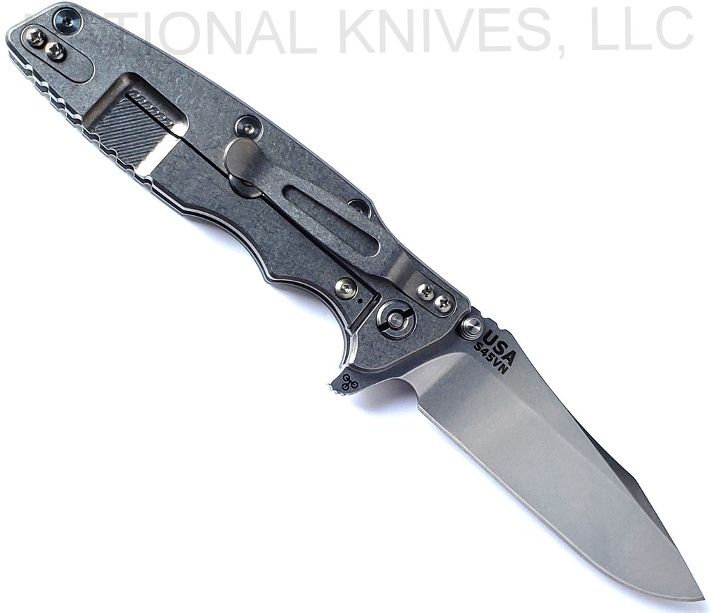 Rick Hinderer Knives Eklipse Spear Point folding knife with flipper tab and thumb stud - shown open lock side.  Stonewash S45VN stainless steel plain edge blade.  Translucent Green G-10 handle with stonewash lock side.  Model KEK35SPE.