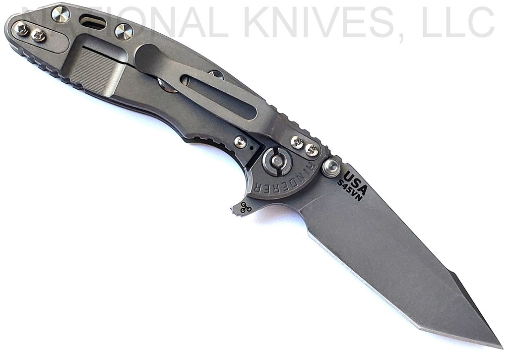 Rick Hinderer Knives XM-18 3.0" Harpoon Tanto folding knife with thumb stud and flipper tab - shown open lock side.  Working Finish S45VN stainless steel plain edge blade.  OD green G-10 handle with Working Finish lock side.  Model KXM3000HT.