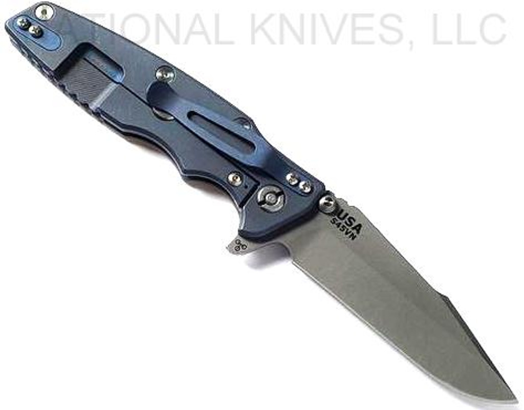 Rick Hinderer Knives Eklipse Harpoon Spanto folding knife with flipper tab and thumb stud - shown open lock side.  Working Finish S45VN stainless steel plain edge blade.  Coyote G-10 handle with Battle Blue lock side.  Model KEK35HSA.