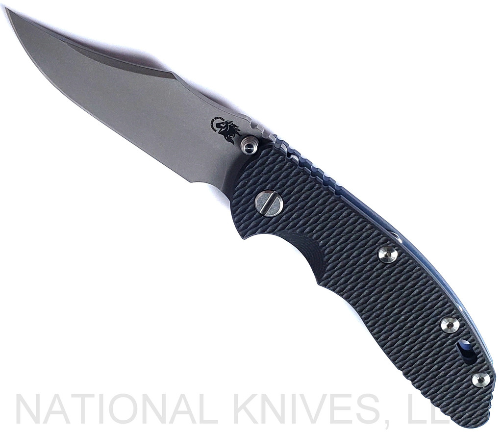 Rick Hinderer Knives Non Flipper XM-18 3.5" Bowie folding knife with thumb stud - shown open presentation side.  Working Finish S45VN stainless steel plain edge blade.  Black G-10 handle with Battle Blue lock side.  Model KXM35NFBOW.