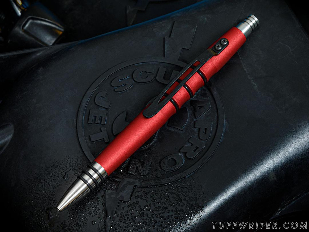 Tuff Writer Precision Press ink pen - shown clip side up.  Alert Red aluminum body with black ink.
