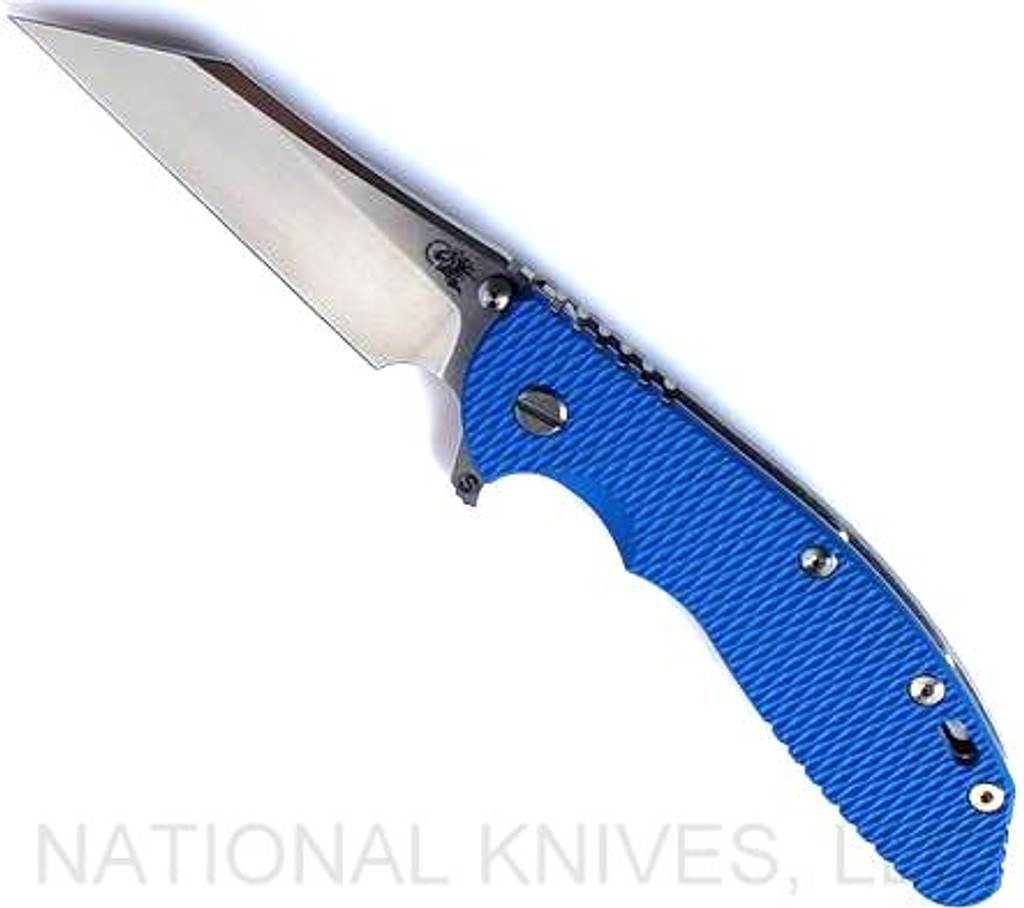 Rick Hinderer Knives Skinny XM-24 Wharncliffe folding knife with thumb stud and flipper tab - shown open presentation side.  Stonewash S45VN stainless steel plain edge blade.  Blue G-10 handle with stonewash lock side.  Model KXM40SKWC.