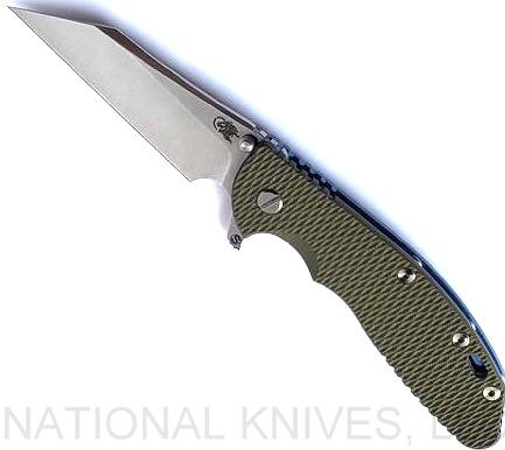 Rick Hinderer Knives Skinny XM-24 Wharncliffe folding knife with thumb stud and flipper tab - shown open presentation side.  Stonewash S45VN stainless steel plain edge blade.  OD green G-10 handle with stonewash blue lock side.  Model KXM40SKWC.