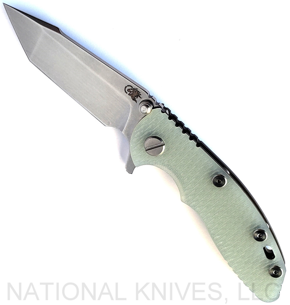 Rick Hinderer Knives XM-18 3.0" Harpoon Tanto folding knife with thumb stud and flipper tab - shown open presentation side.  Stonewash S45VN stainless steel plain edge blade.  Translucent Green G-10 handle with Battle Bronze lock side.  Model KXM3000HT.