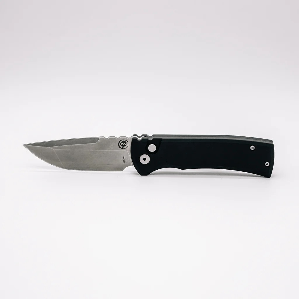 Chaves Knives Pro-Tech Collaboration Redencion 229 Tanto automatic knife - push button side.  Stonewash S35VN stainless steel plain edge blade.  Black aluminum handle.  Model CK-1A10-2B3F-12D1