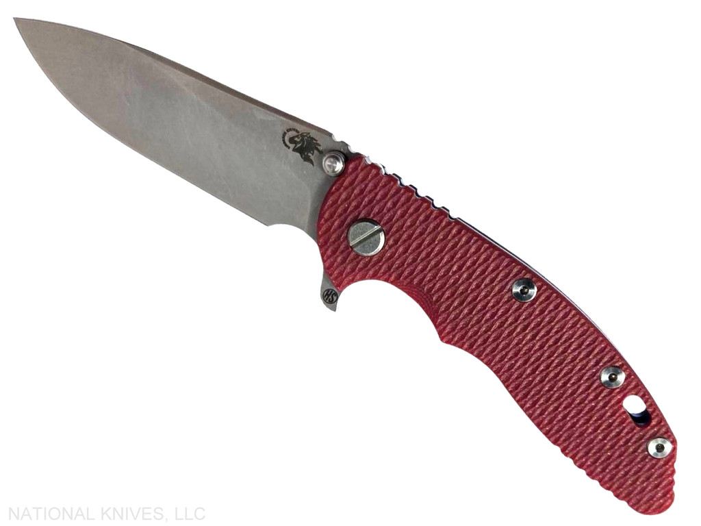 Rick Hinderer Knives XM-18 Skinny Slicer with thumb stud and flipper tab - shown open presentation side.  Stonewash Magnacut stainless steel, hollow ground, plain edge blade.  Red G-10 handle with stonewash blue lock side. 