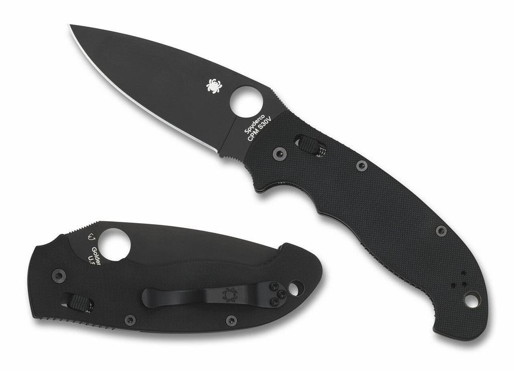 Spyderco Manix 2 XL folding knife with thumb hole - shown open presentation side and closed pocket clip side.  Black S30V stainless steel plain edge blade. Black G-10 handle.  Model C95GPBBK2.