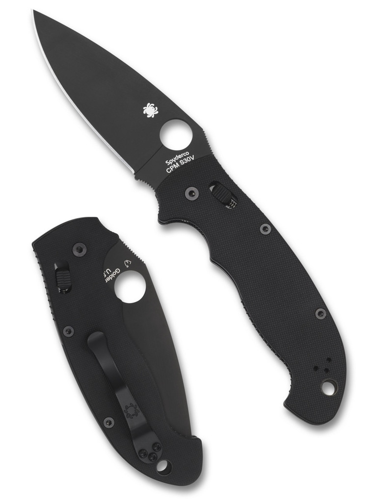 Spyderco Manix 2 XL folding knife with thumb hole - shown open presentation side and closed pocket clip side.  Black S30V stainless steel plain edge blade. Black G-10 handle.  Model C95GPBBK2.