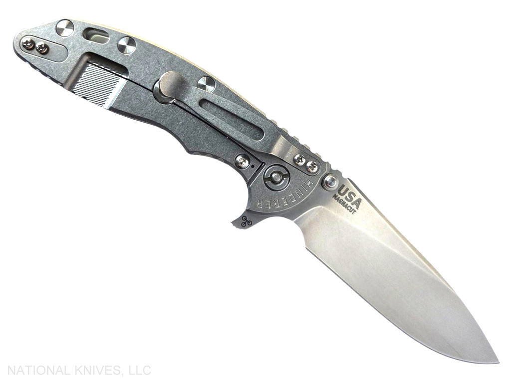 Rick Hinderer Knives XM-18 Skinny Slicer with thumb stud and flipper tab - shown open lock side.  Stonewash Magnacut stainless steel, hollow ground, plain edge blade.  Translucent Green G-10 handle with stonewash lock side. 