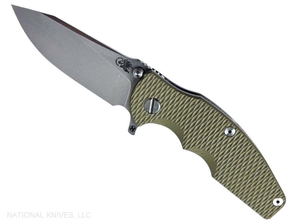 Rick Hinderer Knives Jurassic Hollow Grind Slicer folding knife with flipper tab - shown open presentation side.  Stonewash MagnaCut stainless steel plain edge blade.  OD green G-10 handle scale with stonewash titanium lock side.  Model KJURSLHO.