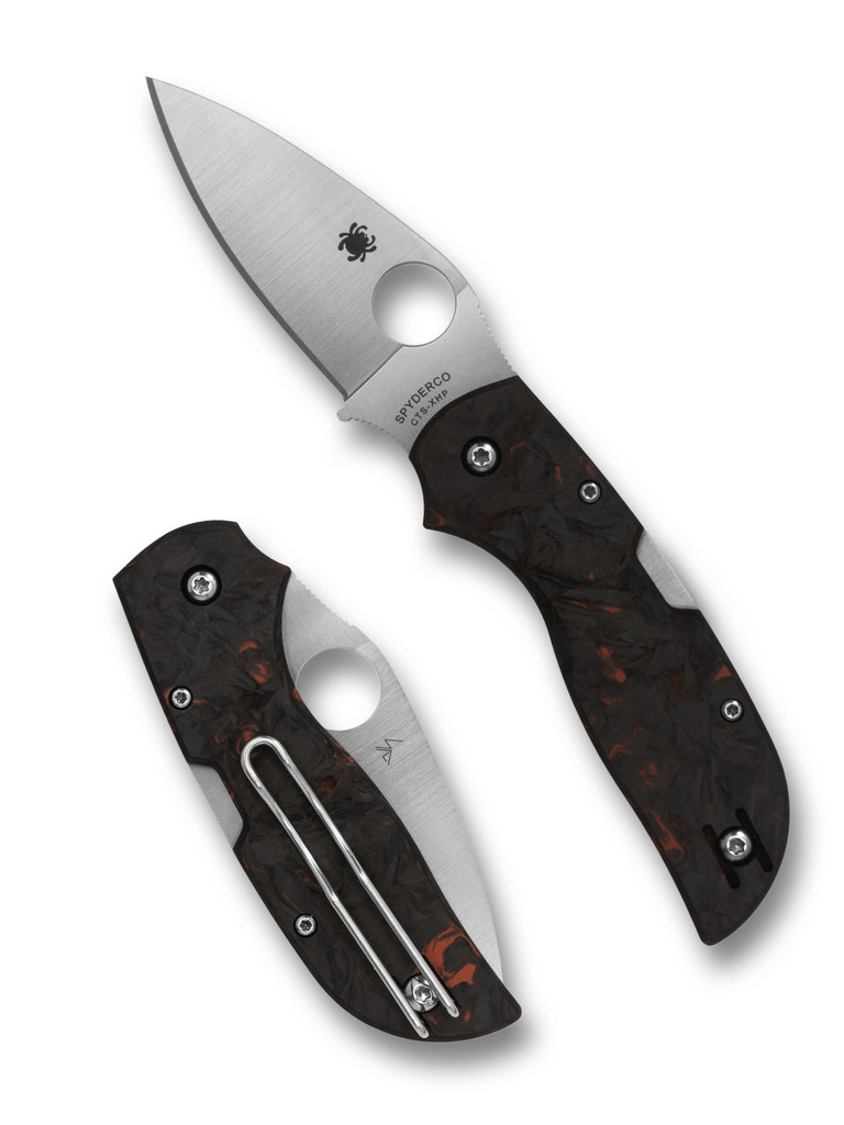 Spyderco Chaparral folding knife with thumb hole - shown open presentation side and closed pocket clip side.  Satin CTS-XHP stainless steel plain edge blade. Red Fatcarbon carbon fiber handle.  Model C152CFRDP.