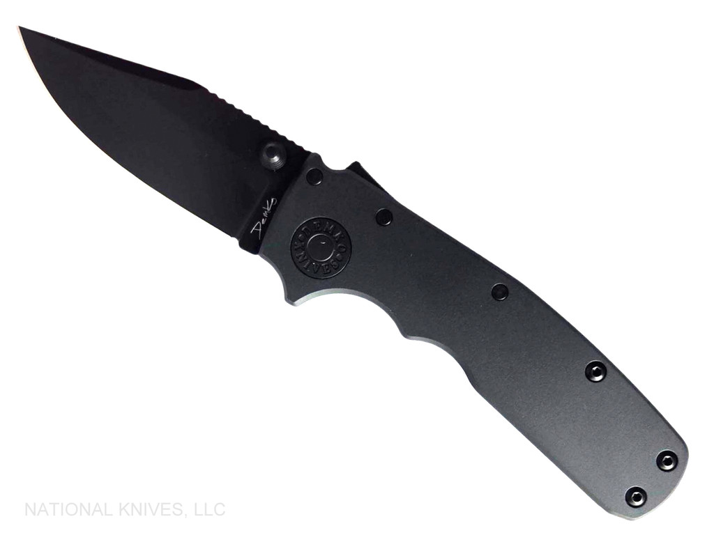 Demko Knives Shark Cub Clip Point folding knife with thumb stud - shown open presentation side.  Black 20CV stainless steel plain edge blade.  Black Aluminum handle.