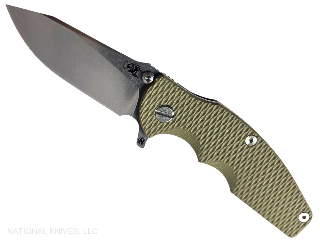 Rick Hinderer Knives Jurassic Hollow Grind Slicer folding knife with flipper tab - shown open presentation side.  Stonewash MagnaCut stainless steel plain edge blade.  OD Green G-10 handle scale with stonewash bronze titanium lock side.  Model KJURSLHO.