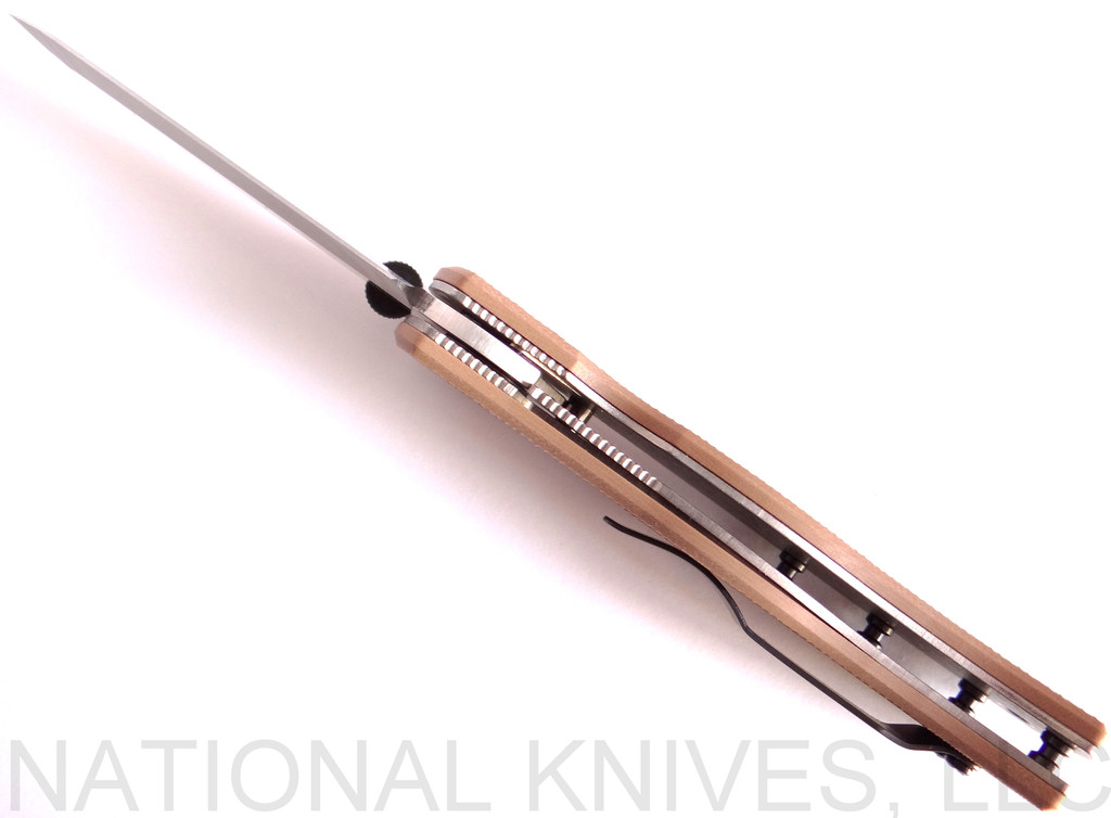 Emerson Knives CQC-7V SF folding knife with thumb disk and Emerson Wave opener - shown open bottom view.  Satin 154CM stainless steel, "V" ground, plain edge blade.  Tan G-10 handle.  Model CQC-7V-SF.