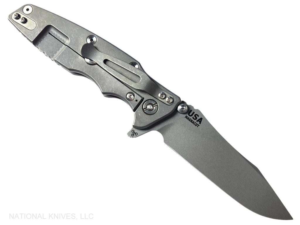 Rick Hinderer Knives Skinny Eklipse Slicer folding knife with flipper tab - shown open - lock side.  Working Finish 3.5" hollow grind MagnaCut stainless steel plain edge blade.  FDE G-10 handle scale with Working Finish lock side.  Model KEK35SKSLHO
