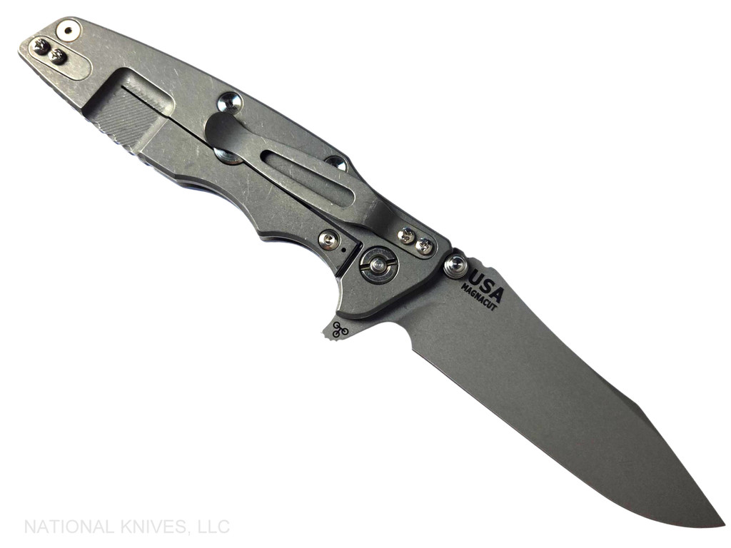 Rick Hinderer Knives Skinny Eklipse Slicer folding knife with flipper tab - shown open - lock side.  Working Finish 3.5" hollow grind MagnaCut stainless steel plain edge blade.  Blue G-10 handle scale with Working Finish lock side.  Model KEK35SKSLHO