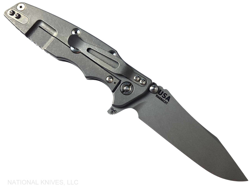 Rick Hinderer Knives Skinny Eklipse Slicer folding knife with flipper tab - shown open - lock side.  Working Finish 3.5" hollow grind MagnaCut stainless steel plain edge blade.  Black G-10 handle scale with Working Finish lock side.  Model KEK35SKSLHO