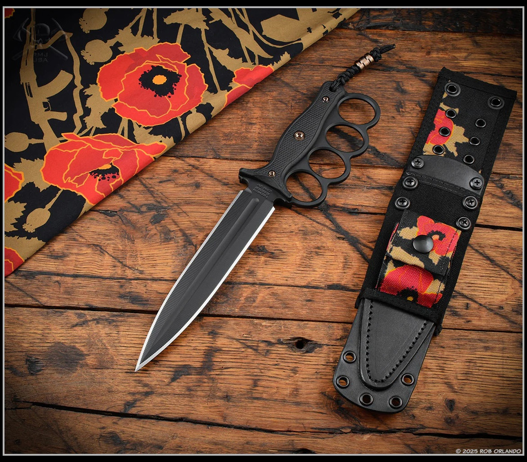 RMJ Tactical Trench Raider - shown out of sheath reverse. Black Cerakote 3V steel double plain edge blade.  Black G-10 handle scales.  Model K-TR-3V-GB-BK-PB.