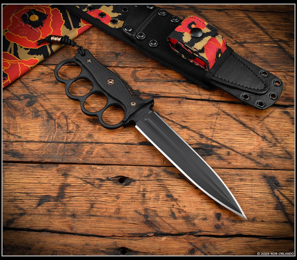 RMJ Tactical Trench Raider - shown out of sheath obverse. Black Cerakote 3V steel double plain edge blade.  Black G-10 handle scales.  Model K-TR-3V-GB-BK-PB.