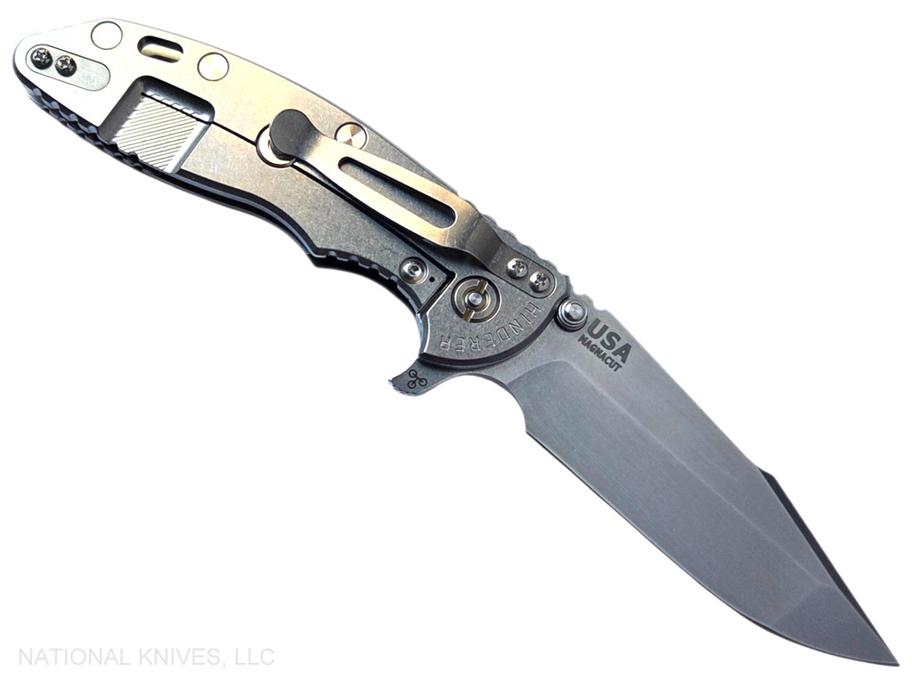 Rick Hinderer Knives XM-18 Skinny Harpoon Spanto with thumb stud and flipper tab - shown open lock side.  Stonewash Magnacut stainless steel plain edge blade.  Black G-10 handle with stonewash lock side.  Model KXM35SKHS.