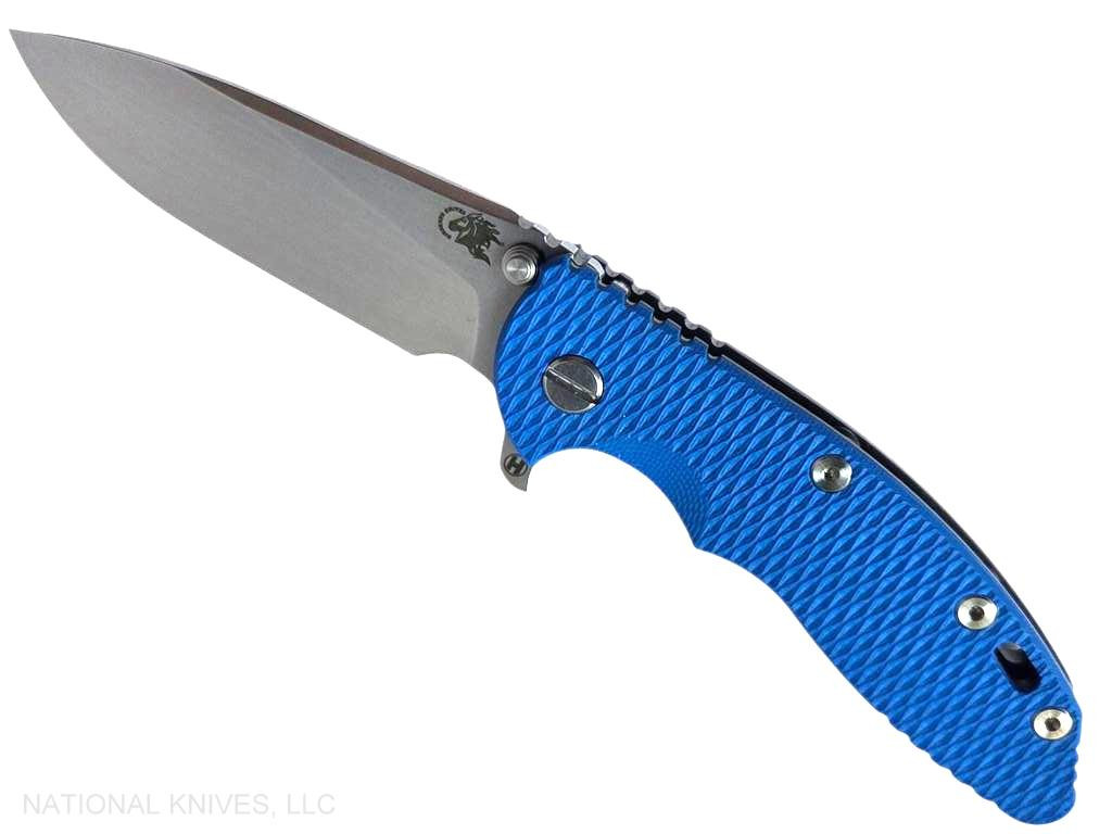 Rick Hinderer Knives XM-18 3.5" Slicer Hollow Grind folding knife with thumb stud and flipper tab - shown open presentation side.  Stonewash 20CV stainless steel plain edge blade.  Blue G-10 handle with Stonewash Black DLC lock side.  Model KXM35SLDLC.