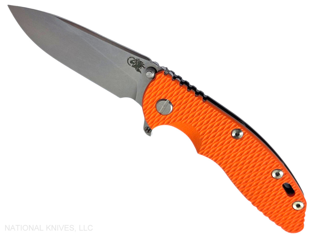 Rick Hinderer Knives XM-18 3.5" Slicer Hollow Grind folding knife with thumb stud and flipper tab - shown open presentation side.  Stonewash 20CV stainless steel plain edge blade.  Orange G-10 handle with Stonewash Black DLC lock side.  Model KXM35SLDLC.