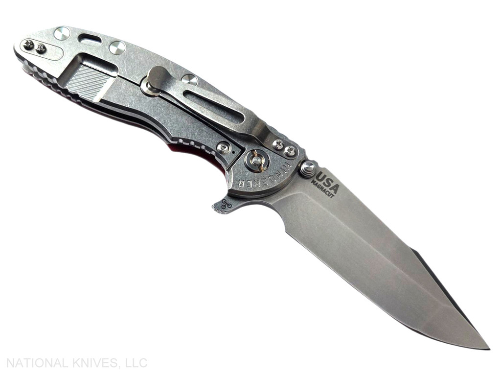 Rick Hinderer Knives XM-18 3.5" Harpoon Spanto folding knife with thumb stud and flipper tab - shown open lock side.  Stonewashed MagnaCut stainless steel plain edge blade.  Red G-10 handle with stonewash lock side.  Model KXM35HS.