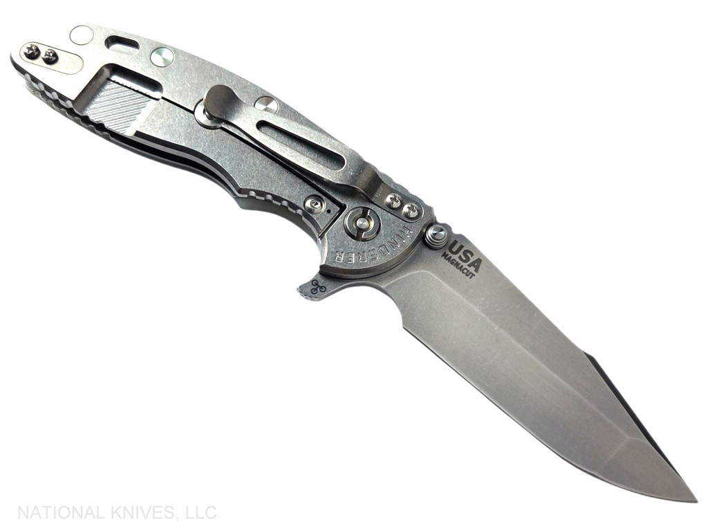 Rick Hinderer Knives XM-18 3.5" Harpoon Spanto folding knife with thumb stud and flipper tab - shown open lock side.  Stonewashed MagnaCut stainless steel plain edge blade.  Translucent Green G-10 handle with stonewash lock side.  Model KXM35HS.